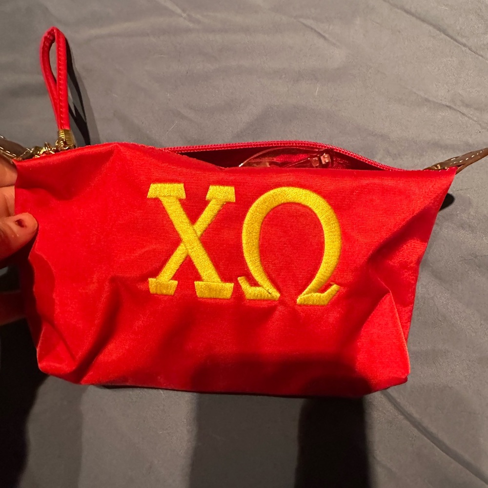 Red ChiO Cosmetic Bag Wristlet bag zipper and wrist strap. Great condition .